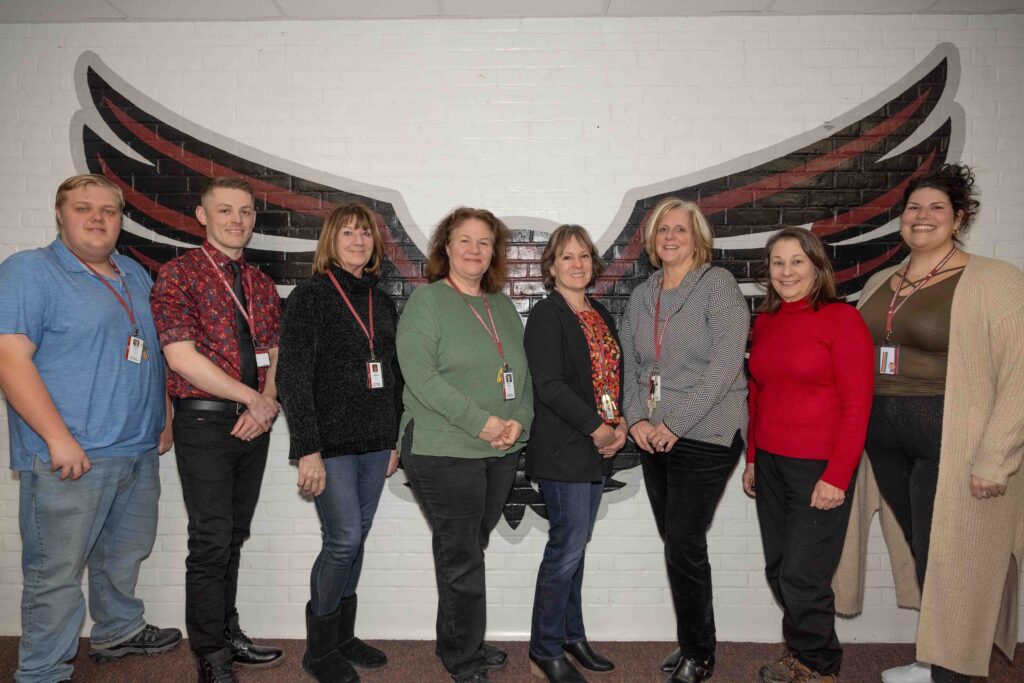 From left to right: Jameson Lynch, Kevin Riendeau, Lisa Tomaszewicz, Michele Foertsch, Brenda Donlin, Lori Wyrebek, Nancy Hill, Allyson Massi