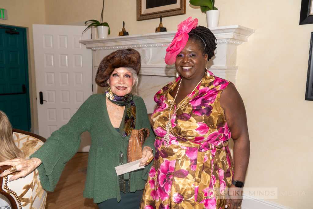 The image captures a powerful and meaningful moment between Diane, a trailblazer who championed inclusivity at The Miami Woman's Club, and Metris Batts, the current president. This photograph symbolizes the club's commitment to diversity, progress, and leadership, celebrating its 125-year legacy of creating an inclusive community where women inspire, support, and empower one another. It highlights the bridge between past and present, honoring the contributions of those who broke barriers and those who continue to lead with purpose.